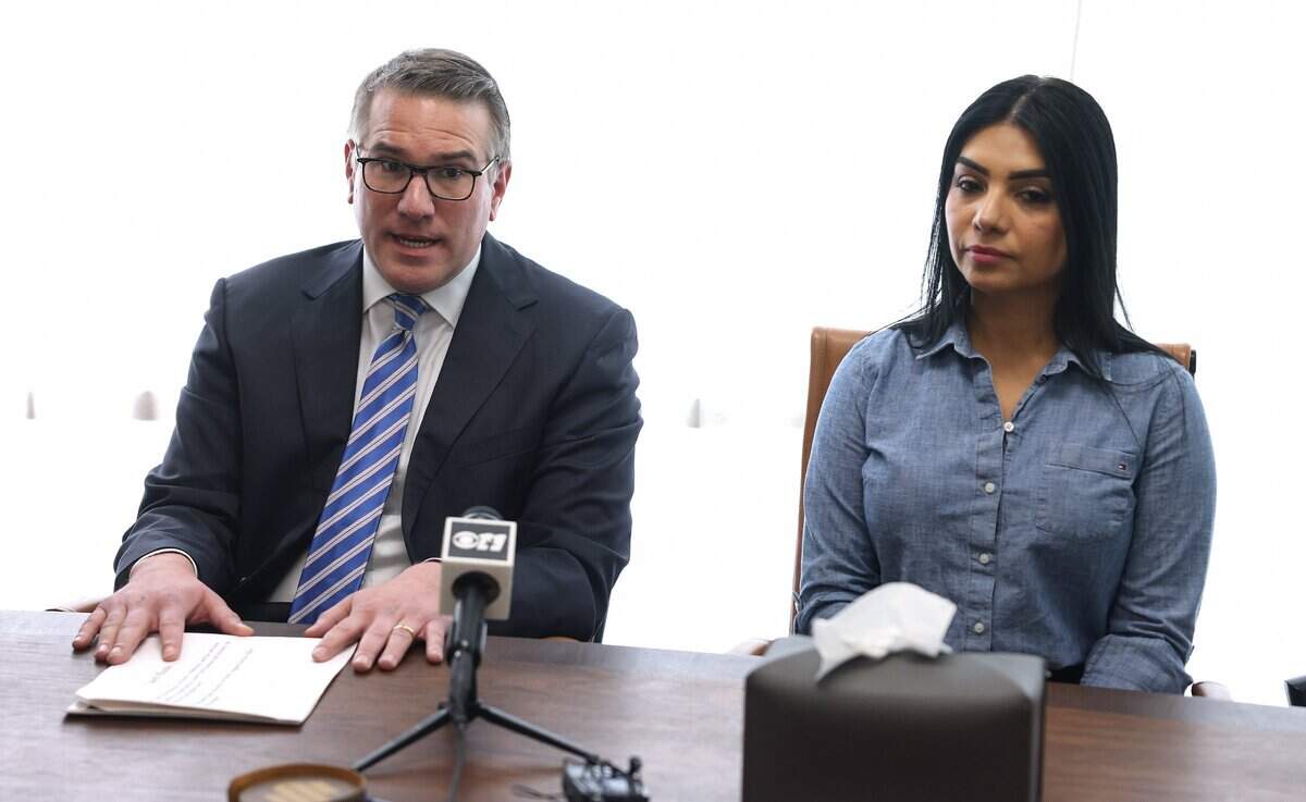 Attorney Frank Sellers, left, holds a press conference with client Mayra Velasquez, right, on Friday, July 31, 2026, at Sellers Law Firm in Fort Worth. Velasquez has been charged with capital murder in the 2012 cold-case stabbing of her friend Irasema Chavez in Arlington.